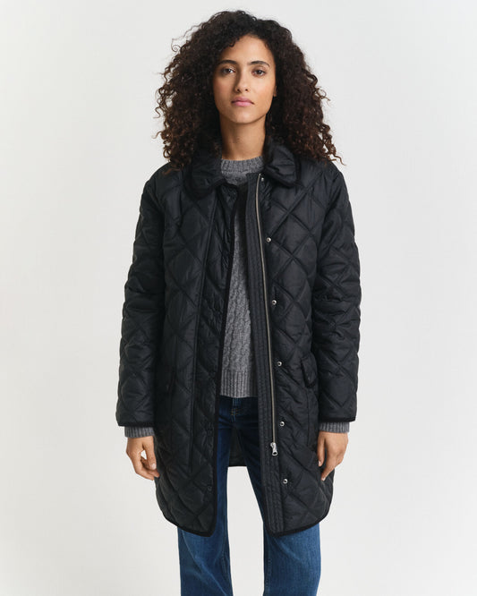 Manteau matelassé avec finitions en velours côtelé