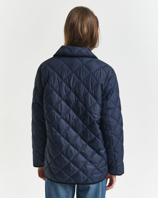 Veste matelassée à finitions en velours côtelé